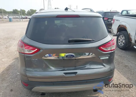 2014 Ford Escape Titanium z USA, uszkodzony, nr VIN 1FMCU0JX4EUE36925